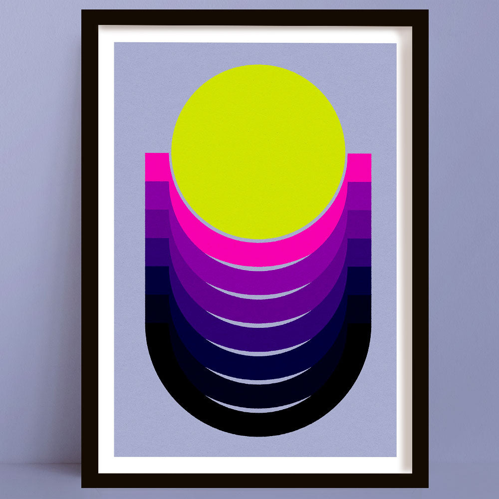 Framed abstract art print with a yellow circle and colorful geometric shapes on a purple background.
