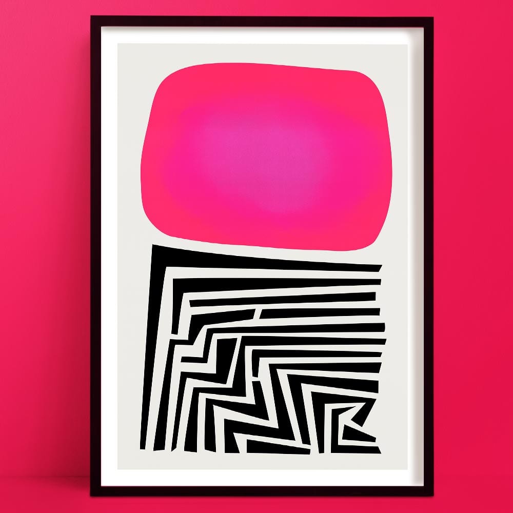 A Labyrinth Abstract Art Print in Vibrant pink and black, with maze-like labyrinth lines and soft edges, framed against a pink wall.