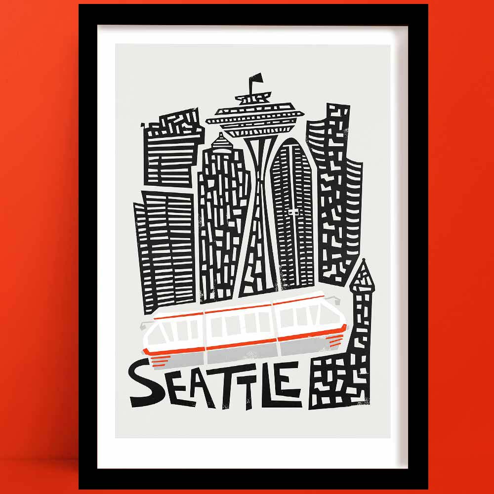 A Seattle print with A bold black-and-white line illustration of the city's skyline featuring the iconic Space Needle, with a pop of retro red from the monorail gliding below the text.