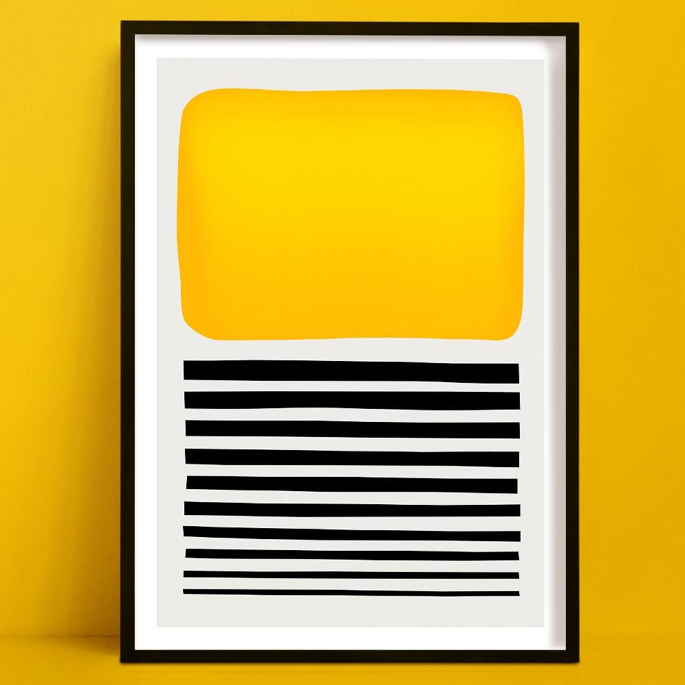 Sticks in the Sand abstract art print a bold abstract print with yellow block and black stripes, framed and set against yellow wall