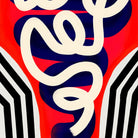 Close-up showing the curved white swirls and layered shapes within the cocktail glass form.