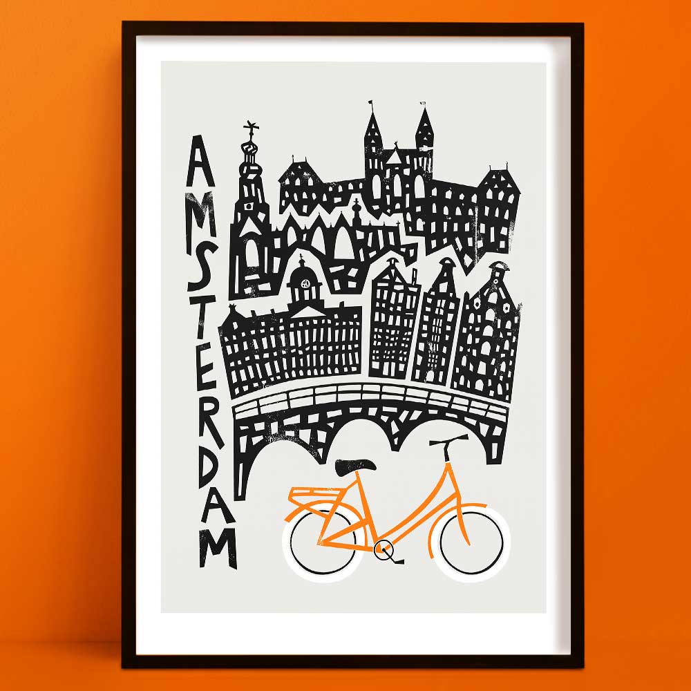 Our Amsterdam print is a stylised black-and-white skyline featuring canal bridges and stepped gables, punctuated by a vivid orange bicycle at the base.