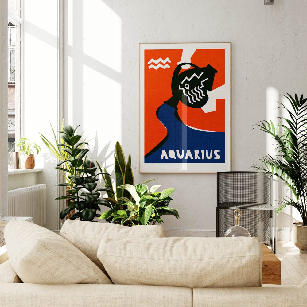 Aquarius zodiac poster framed above a neutral sofa in a bright, plant-filled lounge with soft natural light.