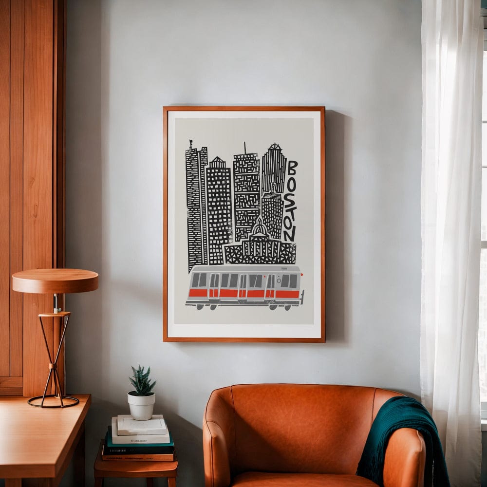 The Boston city print styled in a cosy corner with warm wood and soft furnishings, showing how the bold black lines and red accents pop in a neutral-toned space.