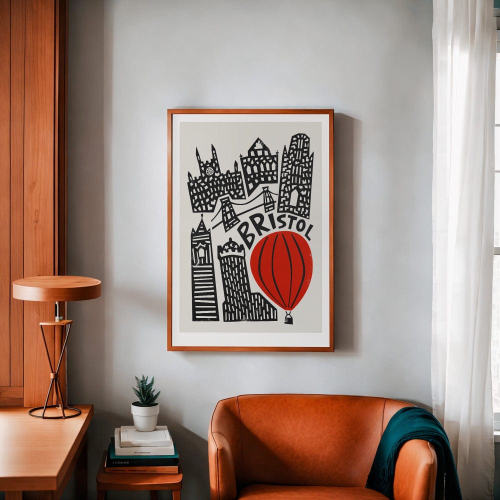 The Bristol art print framed on a neutral wall, styled with burnt orange accents and natural light.
