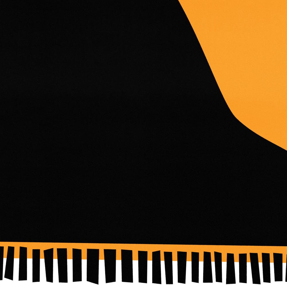 Close-up of the piano print showing black keys and vibrant orange background