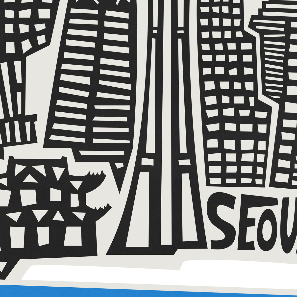 A close-up of a black and white graphic print featuring stylized city skyscrapers and the partial text 'SEO', with a small blue strip visible along the bottom edge.