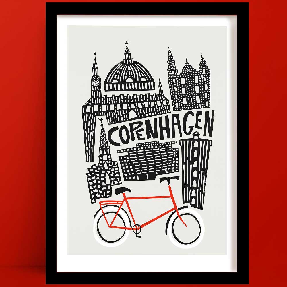 A Copenhagen print with a bold black-and-white illustration featuring iconic architecture, anchored by a striking red bicycle at the base of the design.