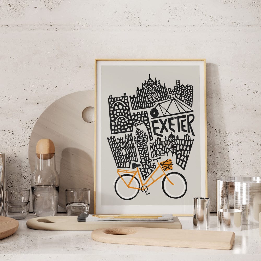 framed Exeter skyline poster bringing retro colour to a modern kitchen wall.