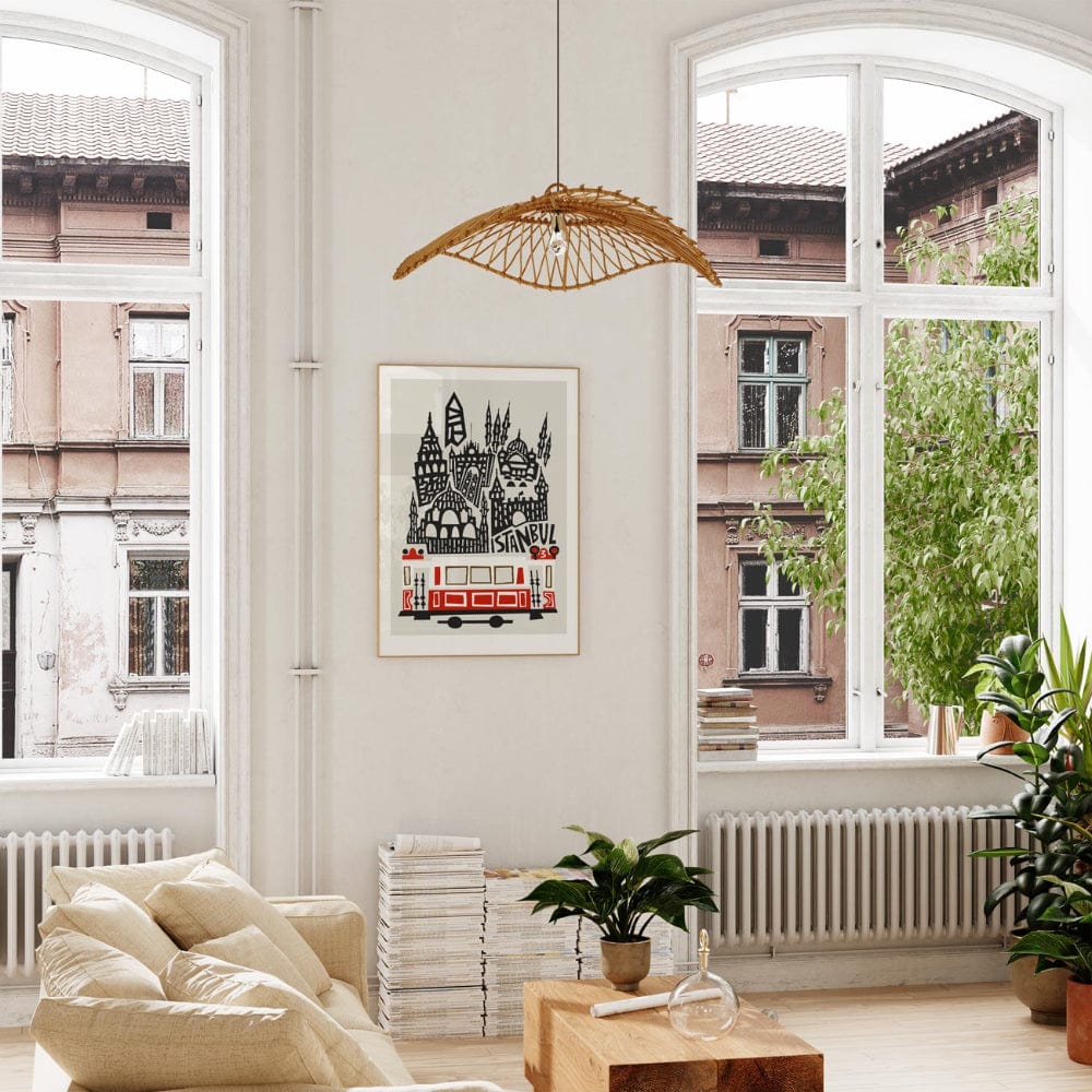 Istanbul city print framed in a bright living room with tall windows and light wood furniture.