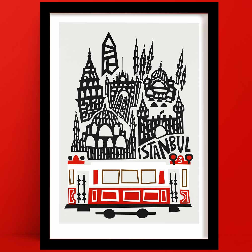 Istanbul print with stylised skyline and iconic red tram, framed on red wall.