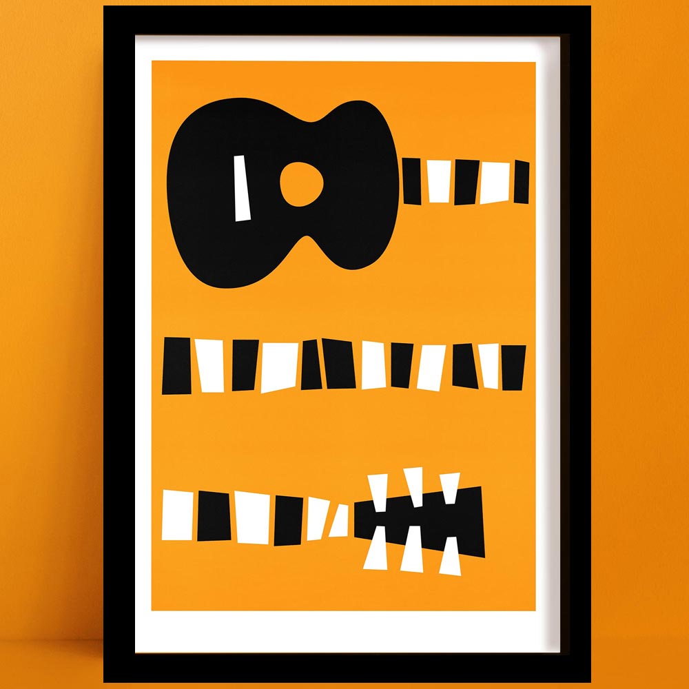 Framed abstract guitar print with bold orange background and black-and-white striped accents, displayed on an orange wall