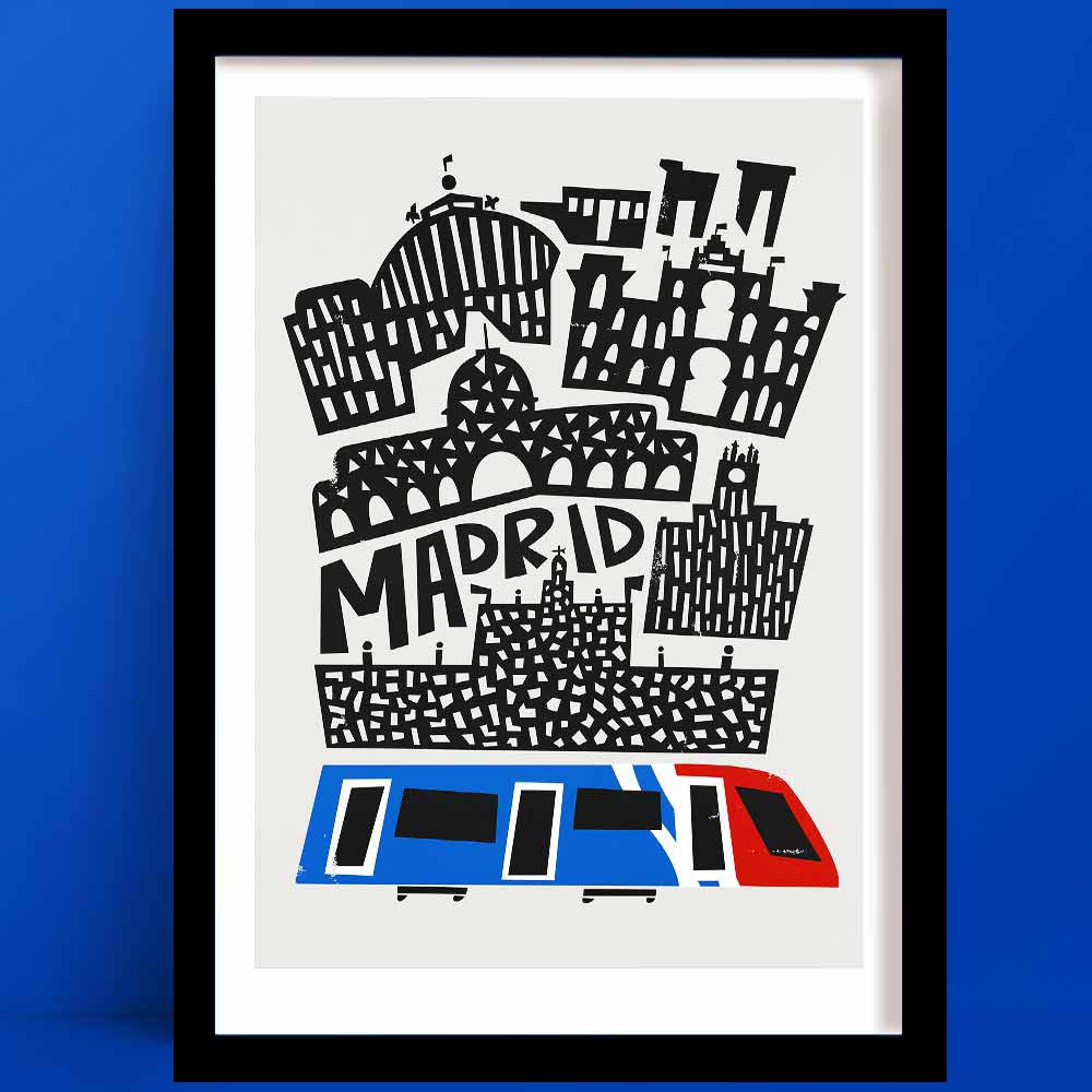 Stylised Madrid print with layered black linework architecture above a colourful red, white and blue city train, framed on a rich cobalt wall.