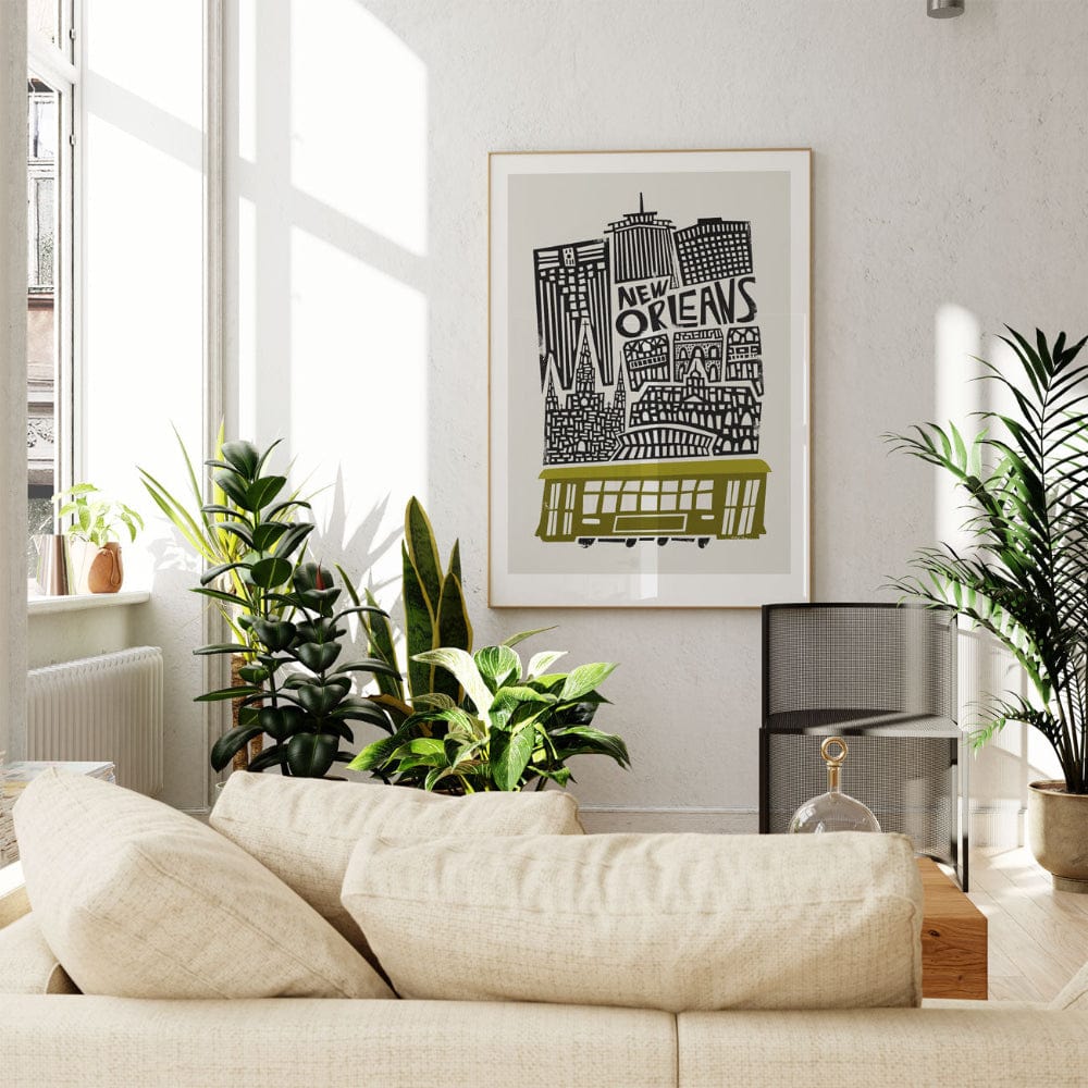 The New Orleans art print hanging above a soft cream couch, bringing a touch of jazz-era charm to a bright, contemporary living room.