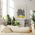 The NYC skyline print with yellow cab is displayed above a neutral sofa, adding a splash of colour and big-city energy to the contemporary space.