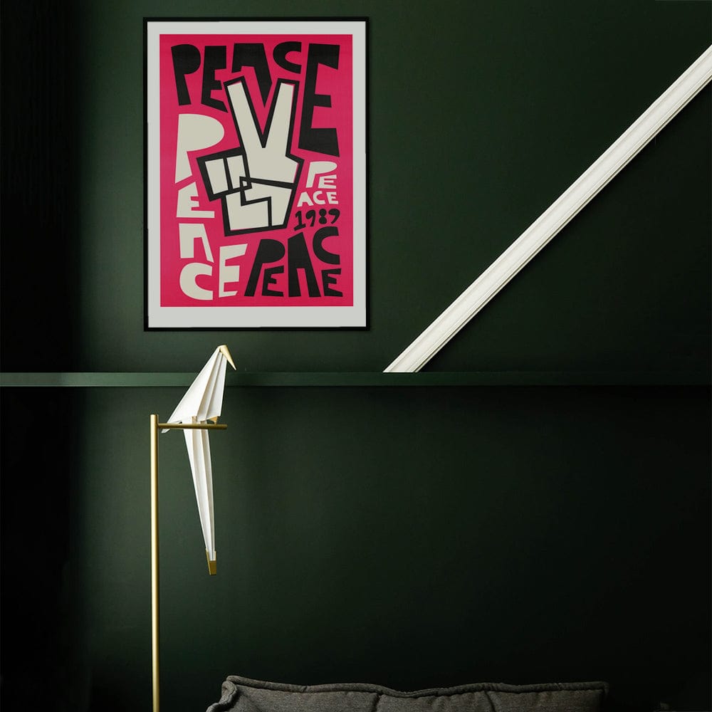 bold pink typography peace print by fox and velvet of a celebration of Berlin Wall falling in 1989 against a green wall in modern apartment