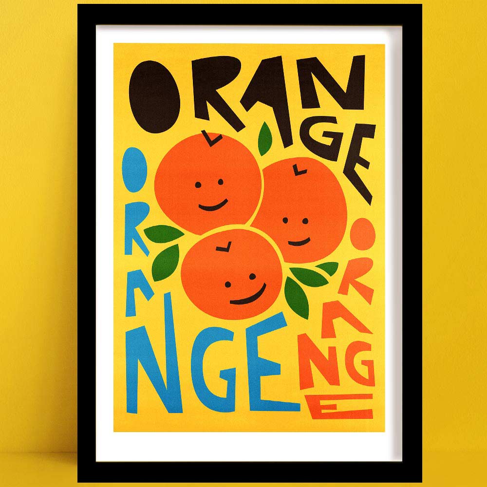 Vibrant Oranges print with smiling fruit faces and bold hand-cut typography.