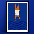 A wild swimming print is a bold graphic of diver mid-dive in white swimsuit and swim cap, set against deep blue waves
