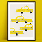 A minimalist pop art New York Taxi print featuring a playful arrangement of five yellow New York taxis in bold block shapes with graphic wheels and checkered stripes.