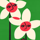 Close-up of bold petal faces and leaf text reading “Don’t Despair” in graphic mid-century lettering.