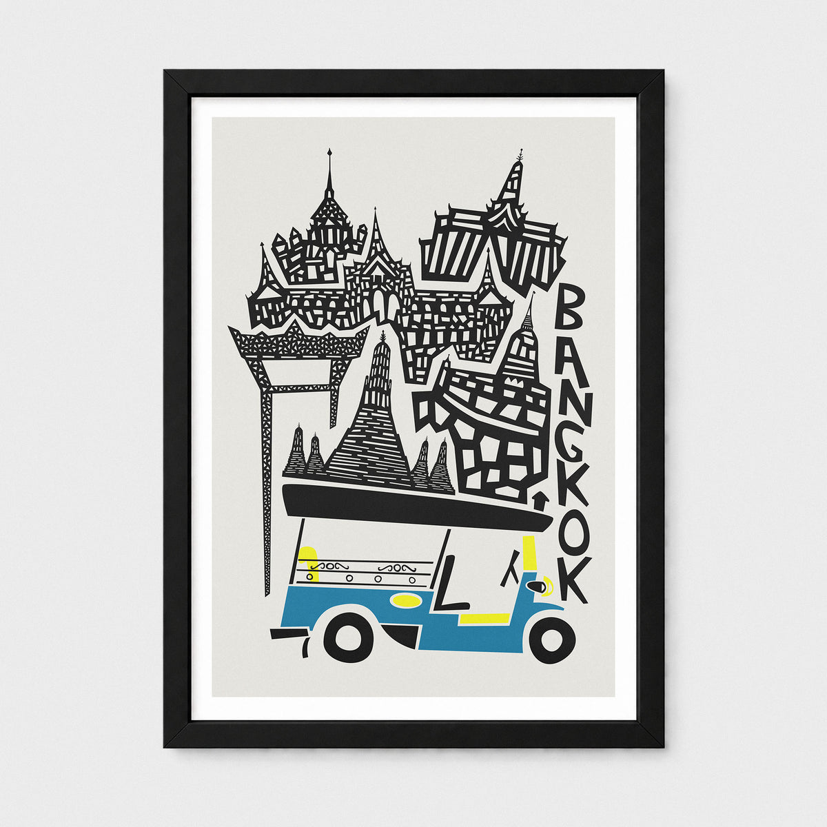 A framed art print featuring a stylized black-and-white illustration of Bangkok landmarks and a blue-and-yellow tuk-tuk on a light gray background, shown against a light gray wall.