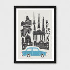 A framed Berlin cityscape art print featuring black architectural silhouettes and a light blue car on a light gray background, shown in a black frame with a white mat against a light gray wall.