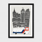 A framed art print featuring a stylized black and white illustration of Birmingham landmarks and a red, white, and blue double-decker bus on a light gray background, shown against a neutral light gray wall.