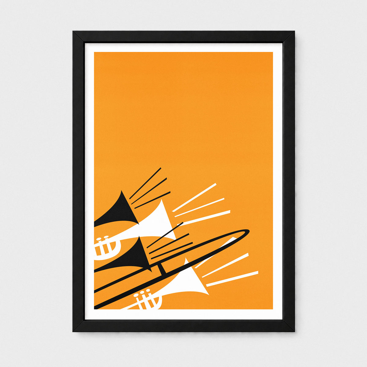 A framed minimalist art print featuring stylized brass instruments in black and white on a solid orange background, enclosed in a black frame with a white mat, shown against a light gray wall.