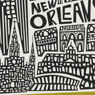 A black and white graphic art print featuring stylized illustrations of New Orleans landmarks, including the Cathedral of Saint Louis and the Arc de Triomphe, with the text 'NEW ORLEANS' at the top.