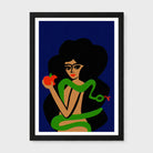 A framed art print featuring a stylized illustration of a woman with dark hair wrapped in a green snake, holding a red apple, set against a dark blue background.