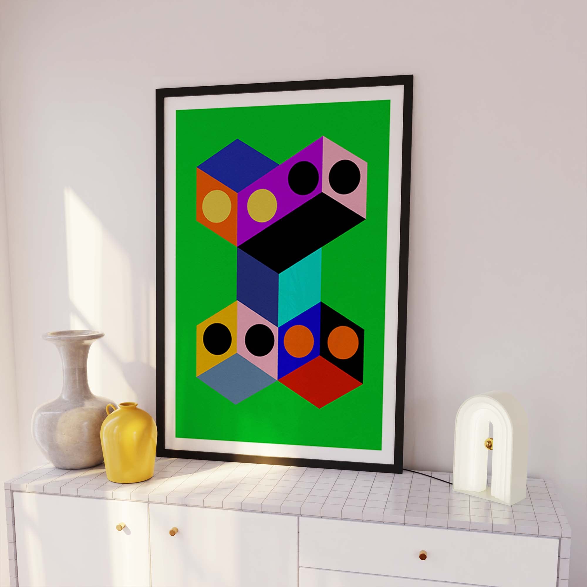 Geometric abstract art print on a white wall with decorative vases.