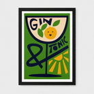 A framed art print featuring a retro-style gin tonic cocktail design. The graphic has a green background with a large dark green wine glass containing a beige section with the text 'GIN' and a yellow-orange gin sphere with green leaves.