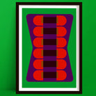 Framed abstract art with red and purple shapes on a green background