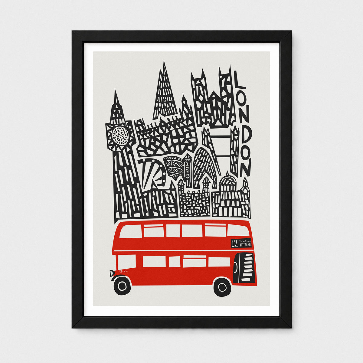 A framed art print featuring a stylized black-and-white illustration of London landmarks above a red double-decker bus on a light gray background, shown in a black frame with white matting.