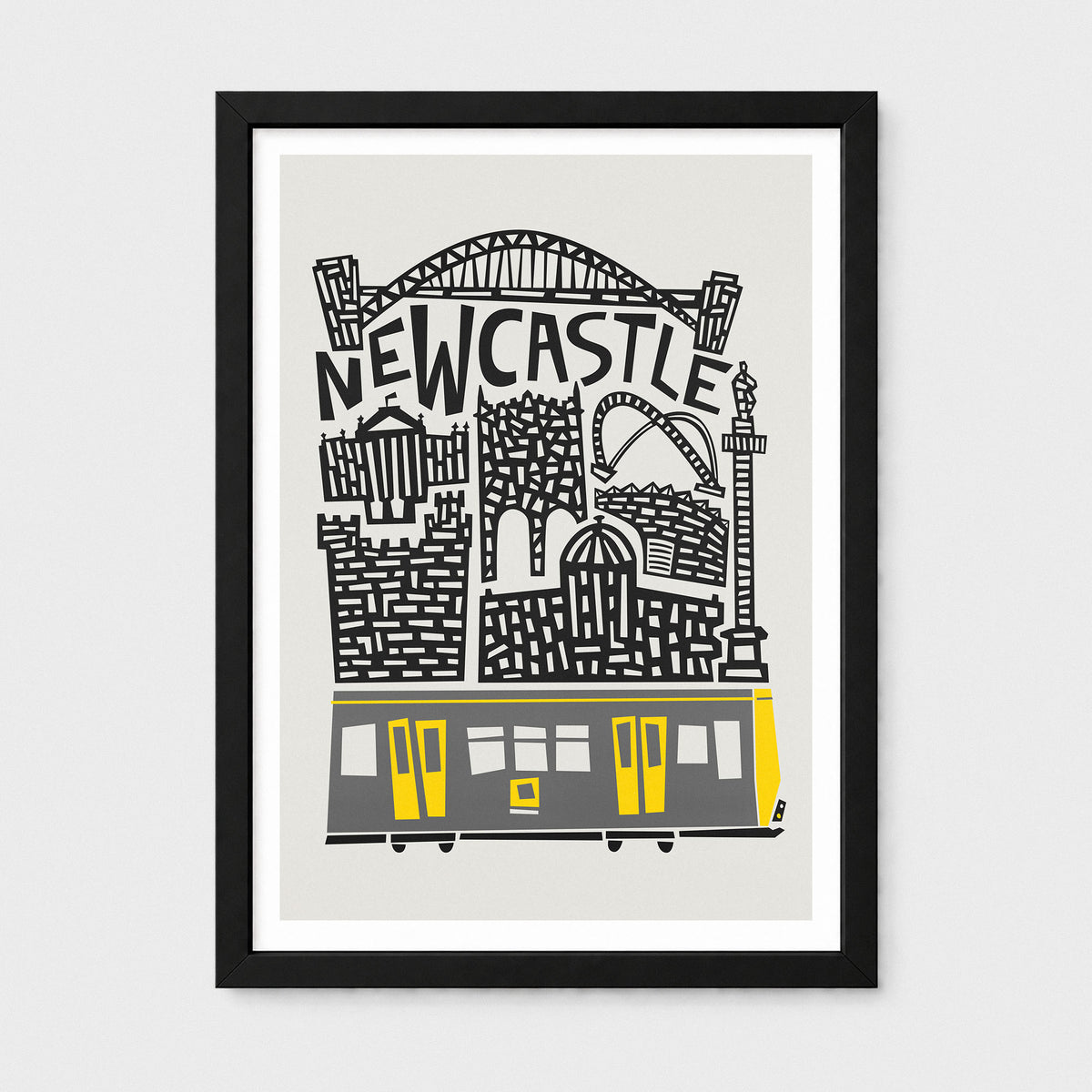 A framed art print featuring a stylized black and white illustration of Newcastle with a yellow tram, shown against a light gray background.