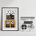 Reel-to-reel tape recorder art print hanging above a silver vintage stereo system in a white room
