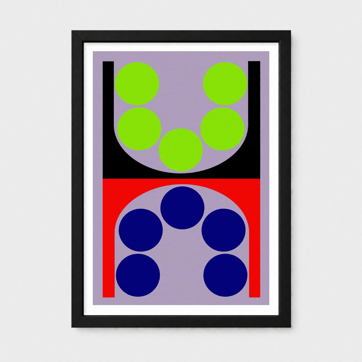 A framed abstract geometric art print featuring a symmetrical design with lime green circles on a lavender background in the top half, and dark blue circles on a red background in the bottom half, enclosed in a black frame with a white mat.