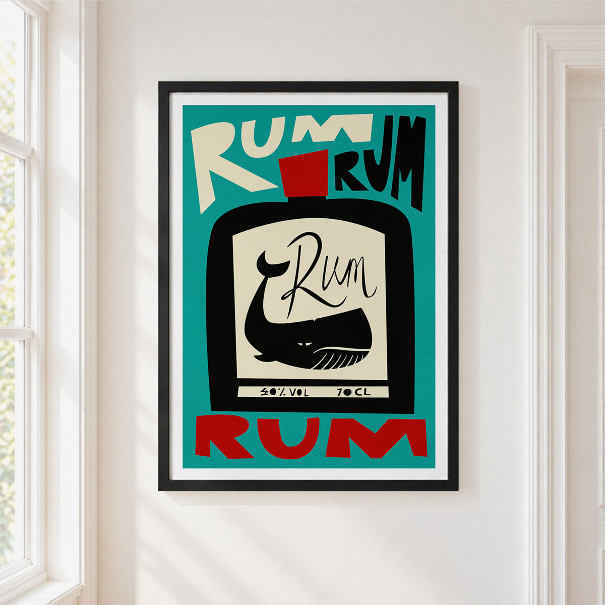 A framed art print featuring a stylized rum bottle illustration with the word 'RUM' in bold letters, hung on a white wall next to a window.