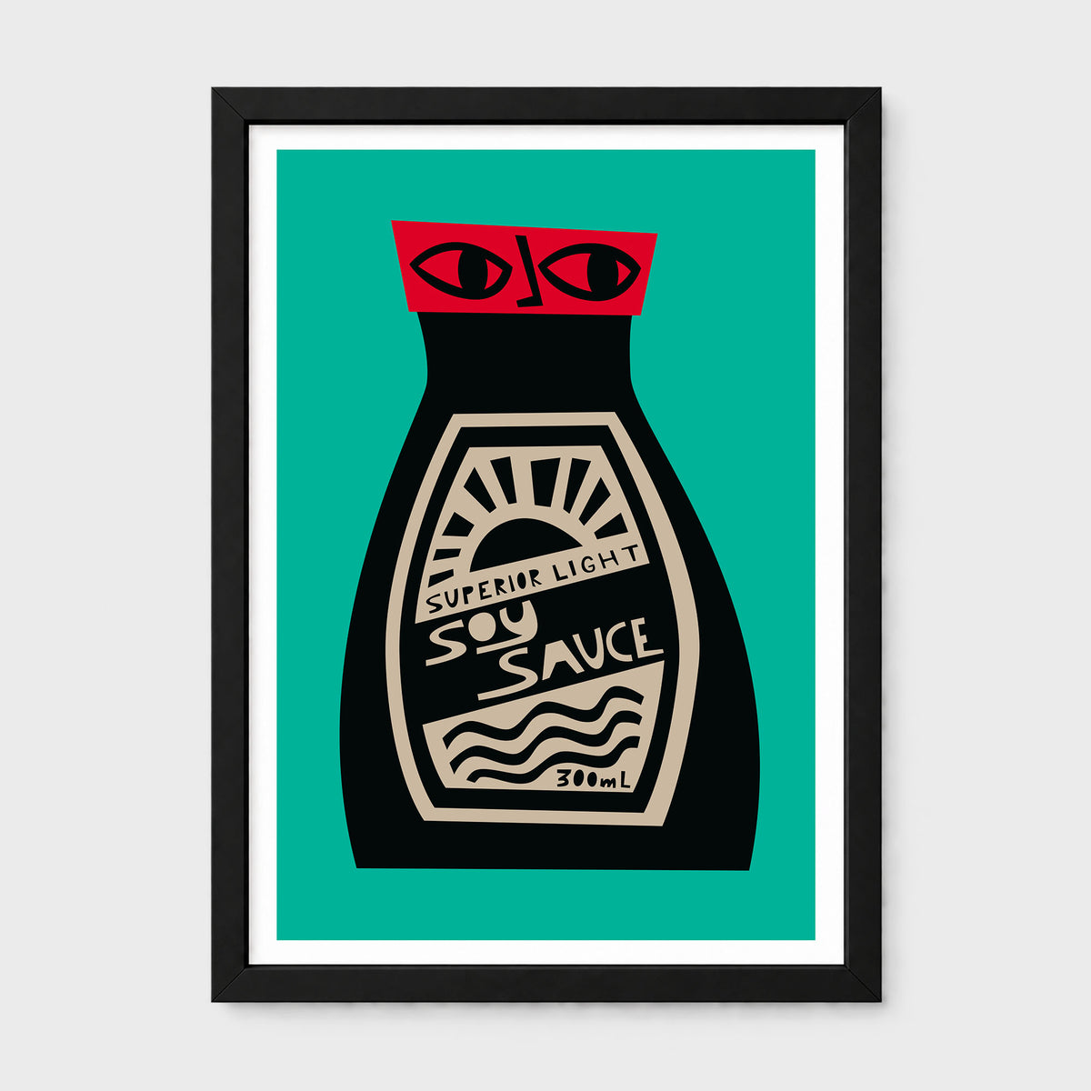 A framed art print featuring a stylized soy sauce bottle illustration. The bottle is black with a beige label and a bright red cap topped with two cartoon eyes.