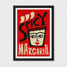 A framed art print featuring a retro-style graphic design with the words 'SPICY MARGARITA' in bold black and cream lettering on a red background, enclosed in a black frame with a white mat.