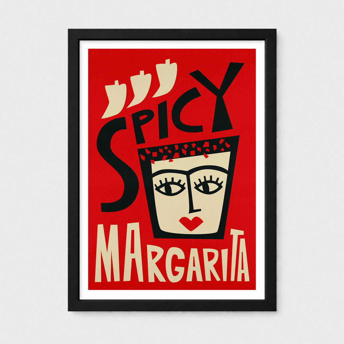 A framed art print featuring a retro-style graphic design with the words 'SPICY MARGARITA' in bold black and cream lettering on a red background, enclosed in a black frame with a white mat.