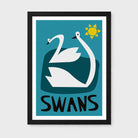 A framed art print featuring a stylized graphic of two white swans on a teal background with a yellow sun and the word 'SWANS' in bold black letters at the bottom. The print is housed in a black frame with a white mat, shown against a light gray background.