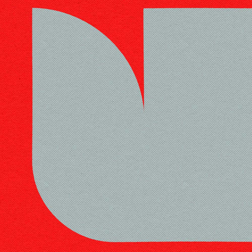 Gray abstract shape on a red background