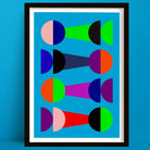 Framed abstract art with colorful geometric shapes on a blue background