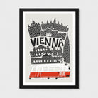A framed art print featuring a stylized black and white map illustration of Vienna with the word 'VIENNA' in bold letters and a red and white tram at the bottom, shown against a light gray background.