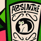 Close-up of the Absinthe bottle label showing stylised black and white cat and hand-drawn type