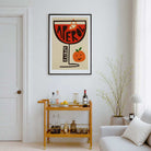 Framed aperol spritz print above a wooden drinks catt