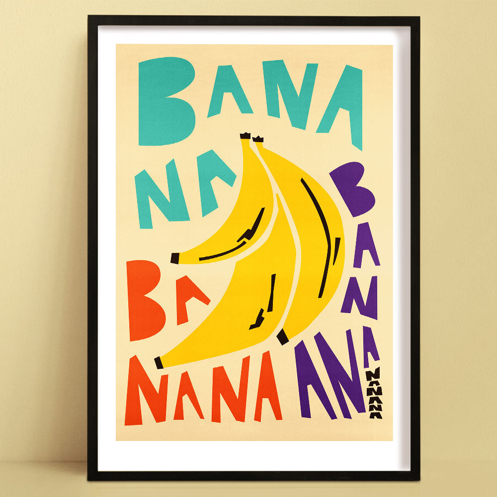 Colourful wall art print featuring overlapping bananas and playful ‘BANANA’ typography in bold hues.