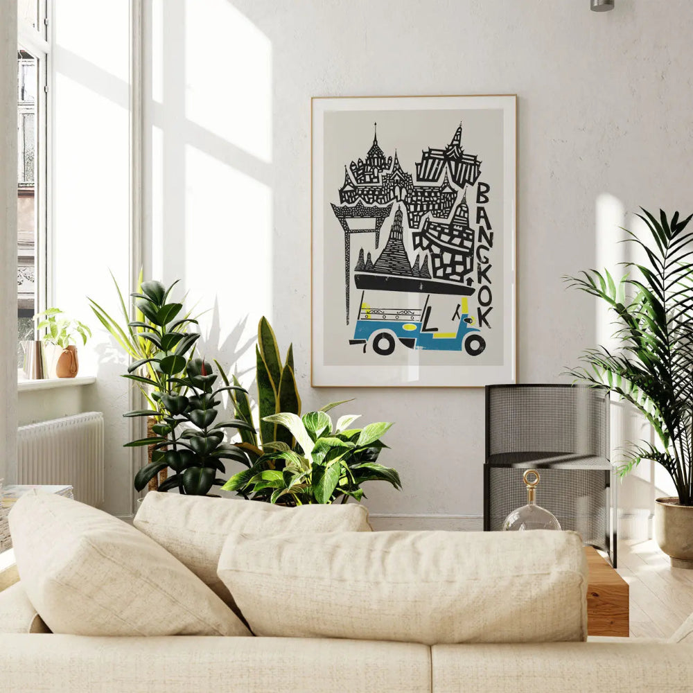 Bangkok city print framed in a light-filled room with greenery, bringing a touch of wanderlust and vintage graphic flair to a minimalist modern space.
