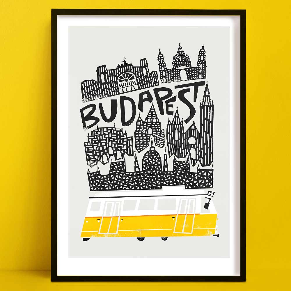A bold black-and-white illustration of Budapest’s skyline, featuring historic landmarks and a vibrant yellow tram at the base.